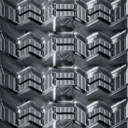 CAT 255 Rubber Tracks with durable chevron-patterned tread and rectangular reinforcements