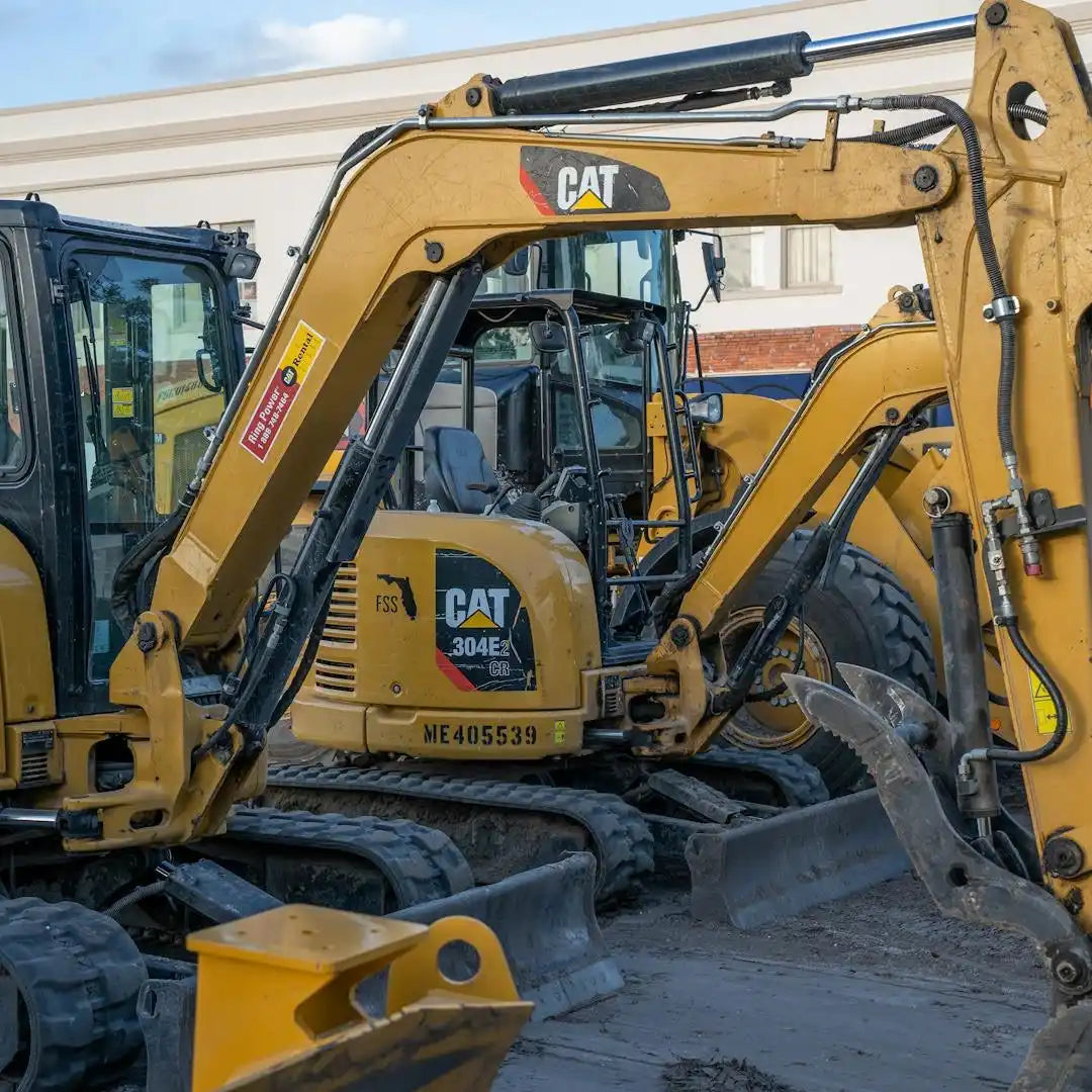 Yellow mini excavator.